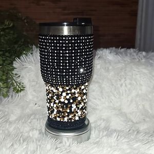Saints colors inspired glass rhinestone tumbler.